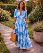 Lara | Vestido midi sin mangas con escote en V y estampado floral