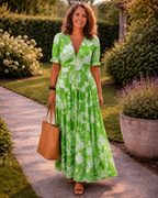 Lara | Vestido midi sin mangas con escote en V y estampado floral